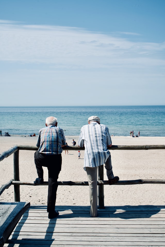 Giancarlos Brothers at Copacabana beach looking at the sea